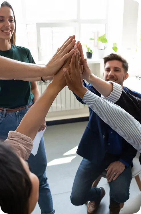 Team members giving each other a high five